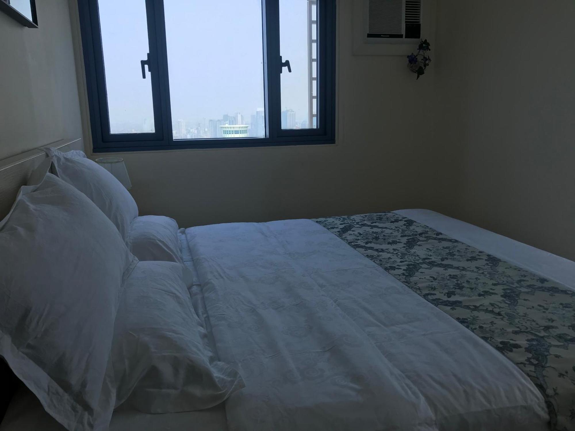 Sunset House Roxas Bay Appartement Manilla Buitenkant foto