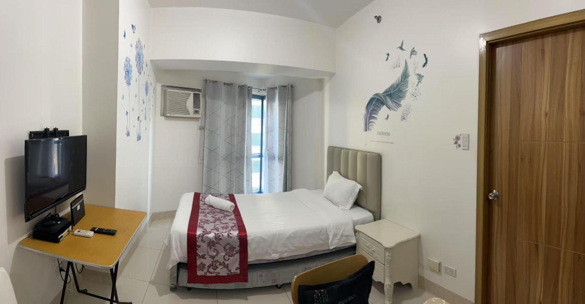 Sunset House Roxas Bay Appartement Manilla Buitenkant foto