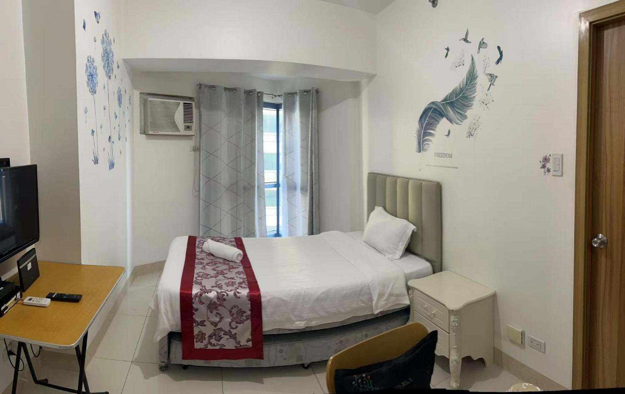 Sunset House Roxas Bay Appartement Manilla Buitenkant foto